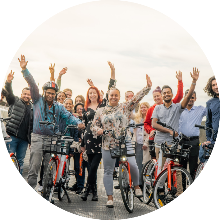 People on a bridge with bikes